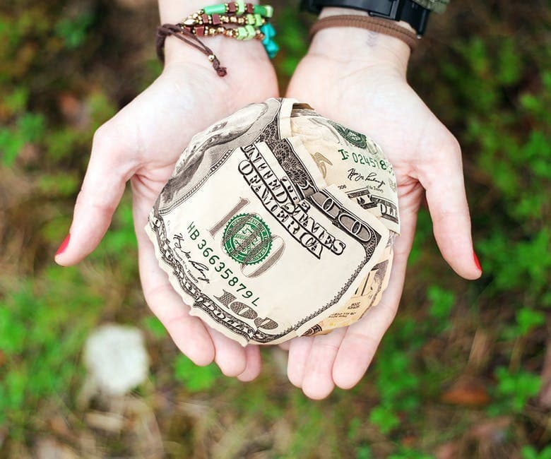 Crumpled 100 dollar bill
